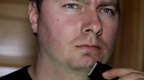 Man shaving with clippers Stock Footage 36645740