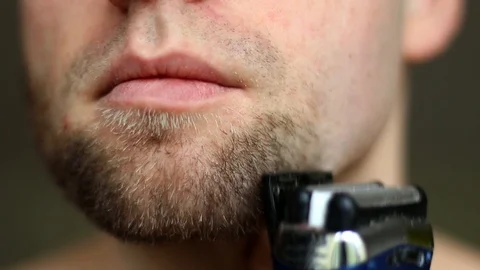 Man Shaving With Electric Razor Close Up Stock Footage 86009155