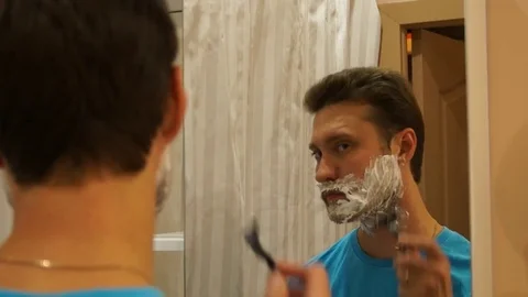 Man shaving with foam Stock Footage 80490278