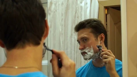 Man shaving with foam Stock Footage 80593190