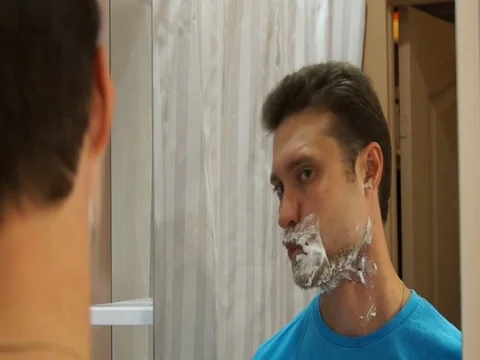 Man shaving with foam Stock Footage 80593215