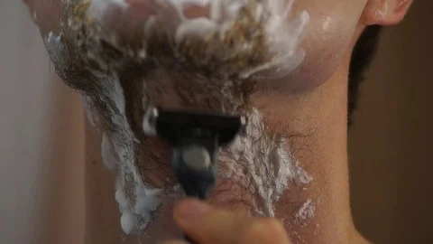 Man shaving with foam Stock Footage 80673464