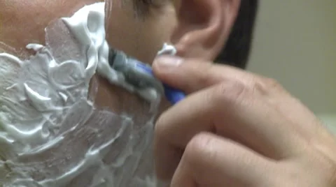 Man shaving Stock Footage 8834398