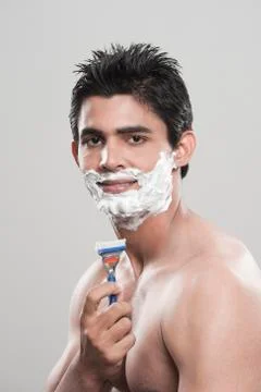 Man shaving Stockfoto's