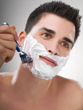 Man shaving Stock Photos