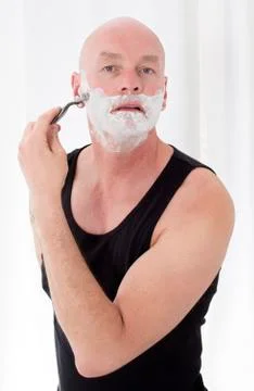 Man shaving Stock Photos