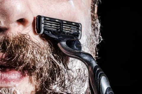 The man is shaving Stock Photos