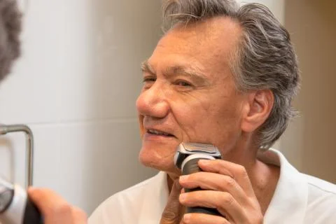 Man Shaving Stock Photos