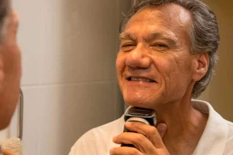 Man Shaving Stock Photos