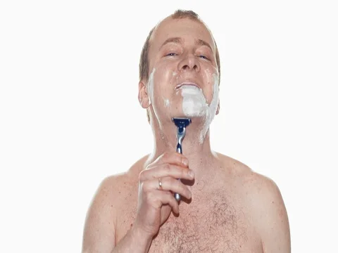 A man shaving. Slow motion Video stock 73699995