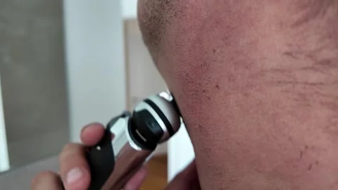 Man shaving with trimmer Stock Footage 315220490