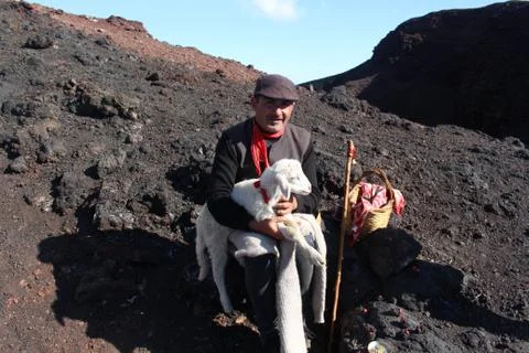 Man with sheep on Mount Etna Stock Photos