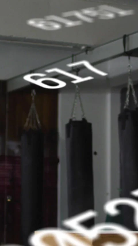 Man shifting, jumping from plyo box, causing numeric overlay continuing Stock Footage 334318984