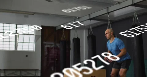 Man shifting weight back pushing off landing jumping onto plyo box for fitness Stock Footage 331833230