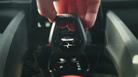 Man shifts mode on automatic transmission of new Polestar 2 Stock Footage 178481708