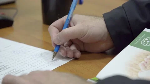 Man in shirt and jacket with documents Stock Footage 225223226