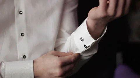 Man in a shirt with cufflinks Stock-Footage 61304335
