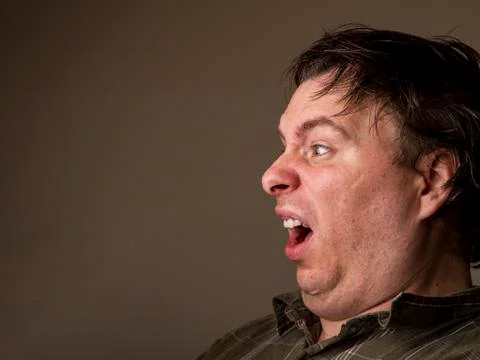 Man shocked at the sight of something Stock Photos