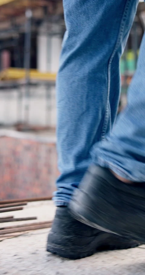 Man, shoes and walk on construction site with inspection, renovation or Stock Footage 340900830