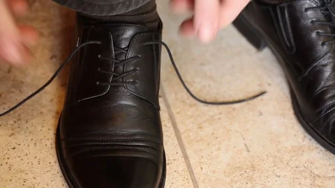 Man shoes laces. Close-up Stock Footage 72581886