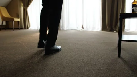 The man in shoes takes a step forward. Stock Footage 268190665