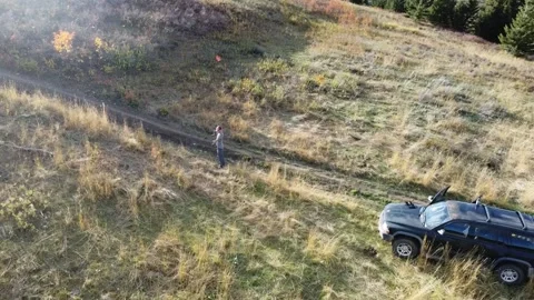 Man shooting archery drone orbit Video stock 312042208