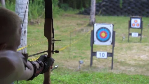 Man Shooting at Archery, Slow motion Stock Footage 74047902