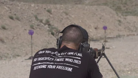 Man shooting automatic rifle at the shooting range Stock Footage 138905795