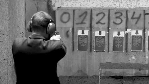 Man shooting with gun at target Video stock 144314823