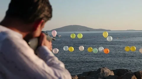 Man shooting HD 1080p Stock Footage 7748971