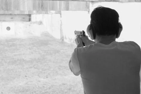 Man shooting Stock Photos