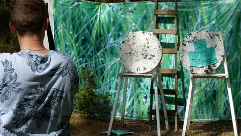 A man shoots an arrow with a bow Stock Footage 90367121