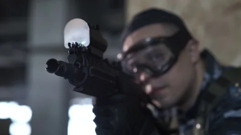 The man shoots at the enemy Видео 75333023