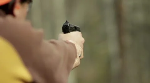 Man Shoots Gun Stock Footage 12595033