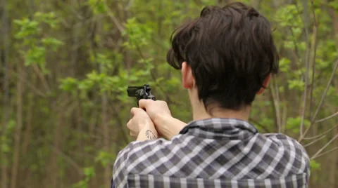 Man Shoots From Pistol Stock Footage 39770149