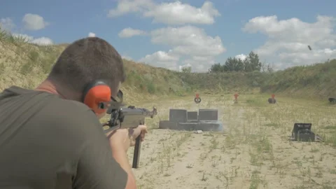 A man shoots TVs at a shooting range Stock Footage 195095448