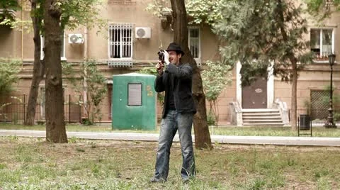 Man shoots video at the camera Stock Footage 11058569