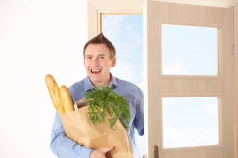 Man with shopping bag Stock Photos
