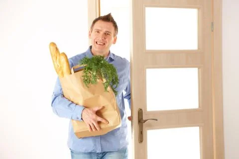 Man with shopping bag Stock Photos
