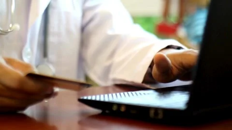 Man shopping online using laptop computer and credit card Smiling customer Stock Footage 265932691