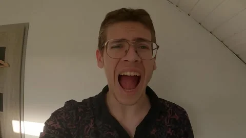 Man shouting both angrily and sadly. Man shouting concept 動画素材 276161304