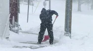 Man Shoveling Snow  Stock Footage