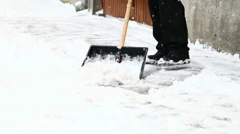 Man shoveling snow Stock Footage 10761197