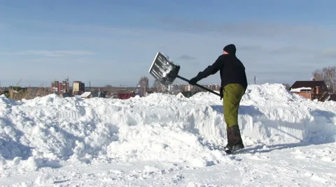 Man Shoveling Snow Video stock 47802174