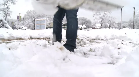 Man Shoveling Snow Stock Footage 57703367