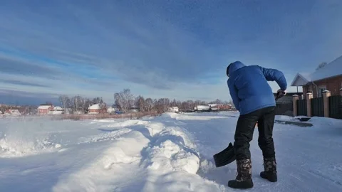 Man Shoveling Snow 스톡 동영상 169453374