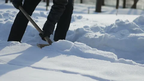 Man shoveling the snow from the path Stock Footage 87225963