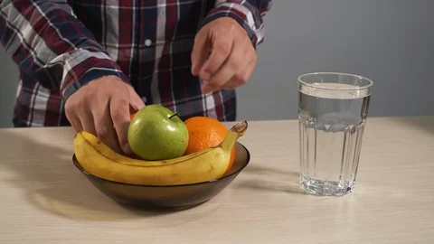 Man show different fruit on plate closeup preparing for preparation 4K cocktail Stock Footage 114608491