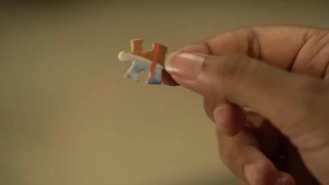 Man show a puzzle piece Stock Footage 295103828