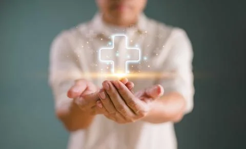 Man show virtual blue plus sign, positive thinking mindset, healthcare insura Foto stock